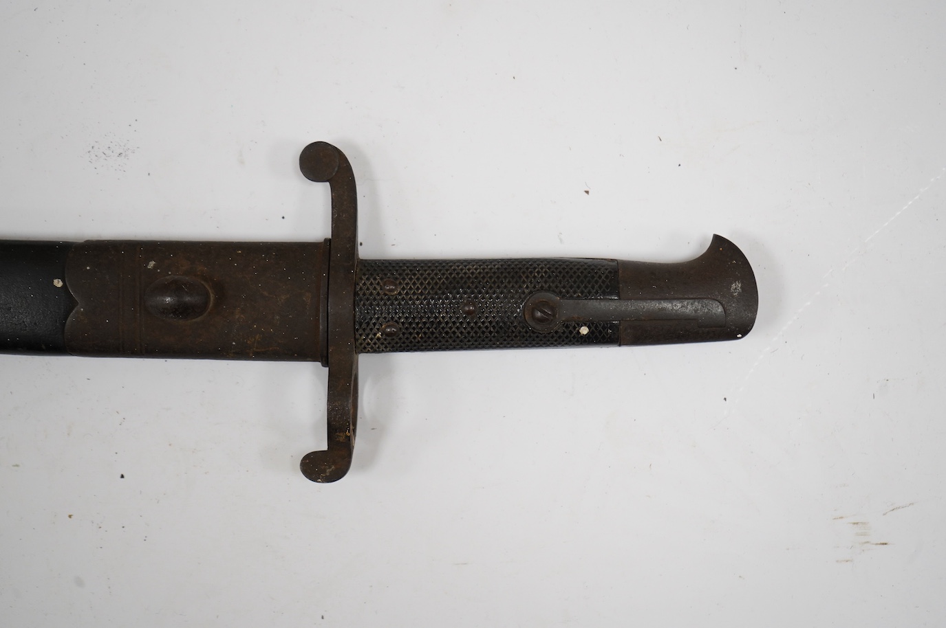 A Middlesex Rifle Volunteers bayonet, named to George Brooking, with regimental badge, owner’s name and initials, all on the blade, regulation Enfield hilt and iron mounted leather scabbard. Condition - fair.